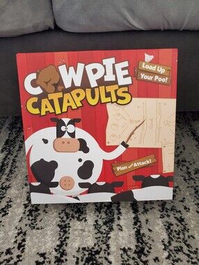 Cow pie catapult Good Game Company fun game